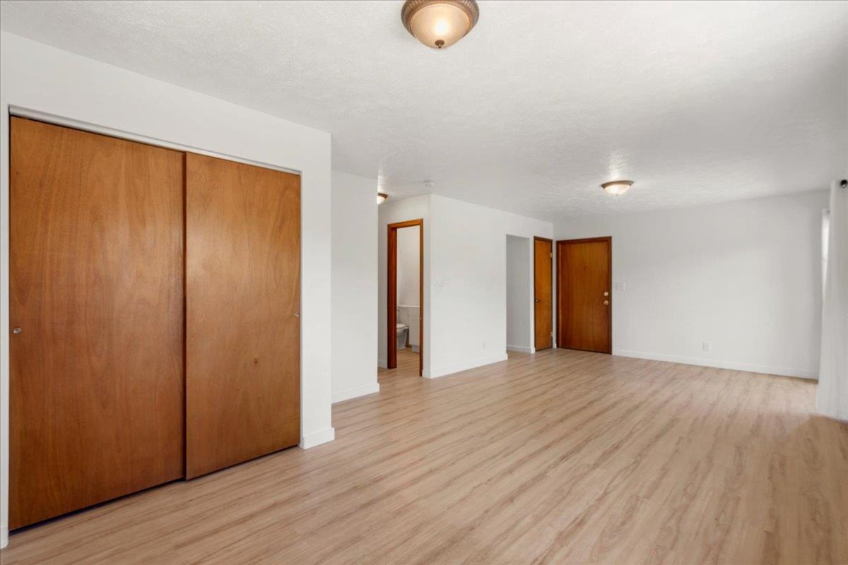 2130 Kauhikoa Road, Unit A Haiku, HI 96708 - Photo 21 of 43 a view of an empty room with wooden floor