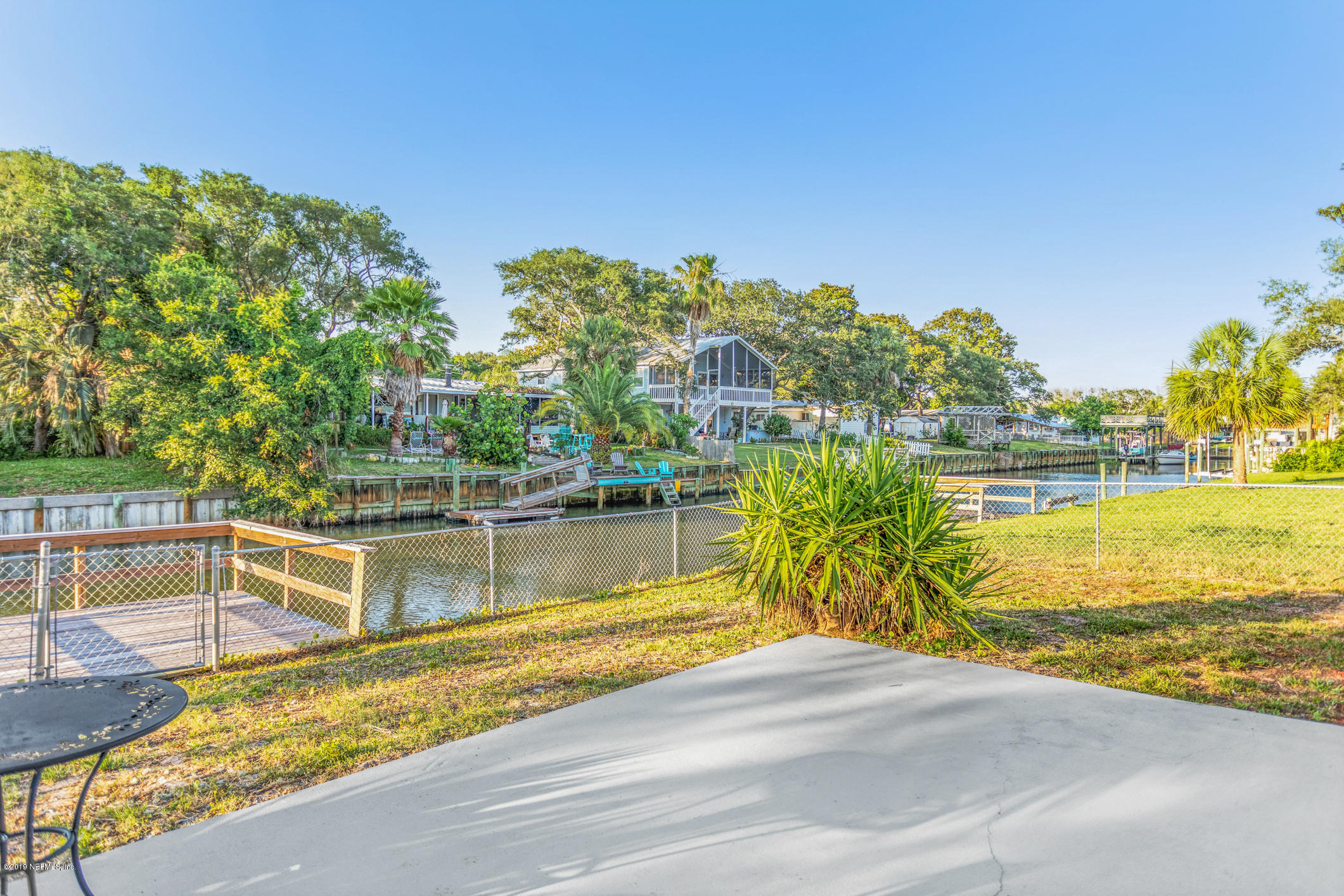 242 Puebla Road St. Augustine, FL 32080 - Photo 35 of 48 a view of a lake with a nearby beach