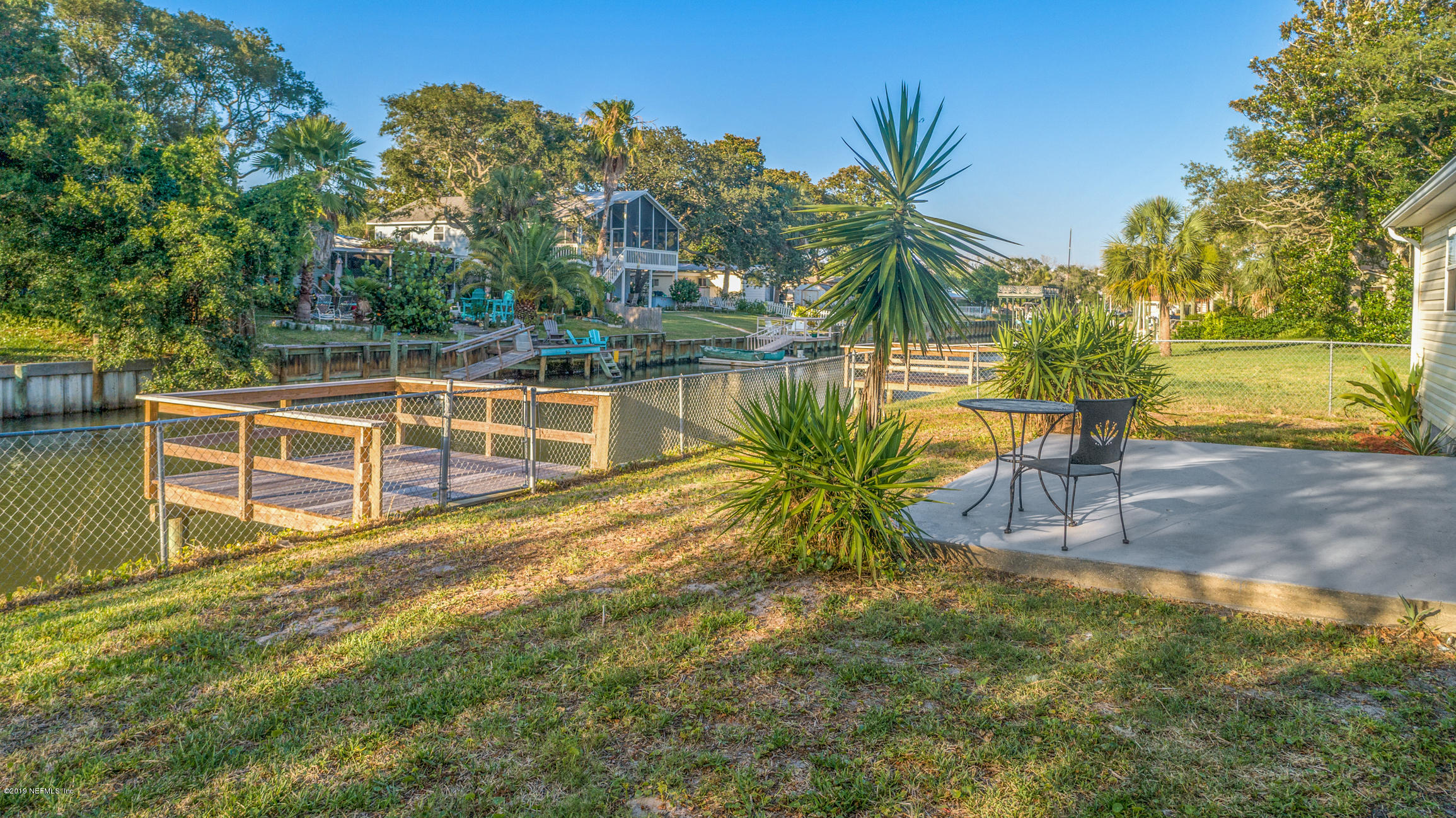 242 Puebla Road St. Augustine, FL 32080 - Photo 48 of 48 a view of a yard with a patio