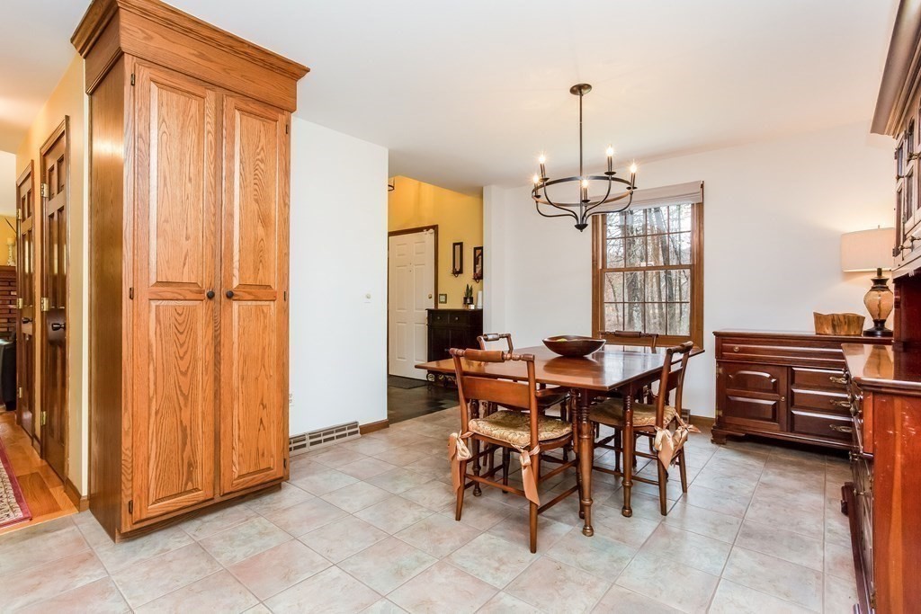 218 Somers Road Hampden, MA 01036 - Photo 8 of 32 a view of a dining room with furniture window and wooden floor
