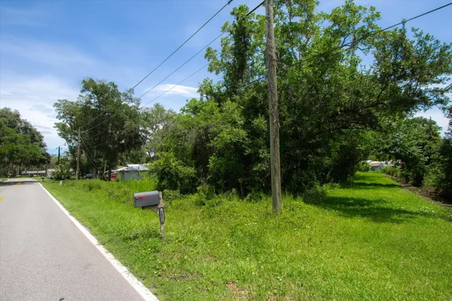 a view of a garden with an outdoor space
