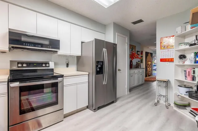 $360,000 | 3351 Emerald Oaks Drive, Unit 103, Hollywood, FL 33021