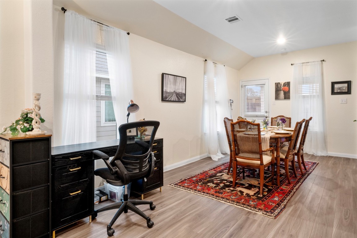22565 Cormorant Court Splendora, TX 77372 - Photo 13 of 31 a view of a workspace with furniture and a window