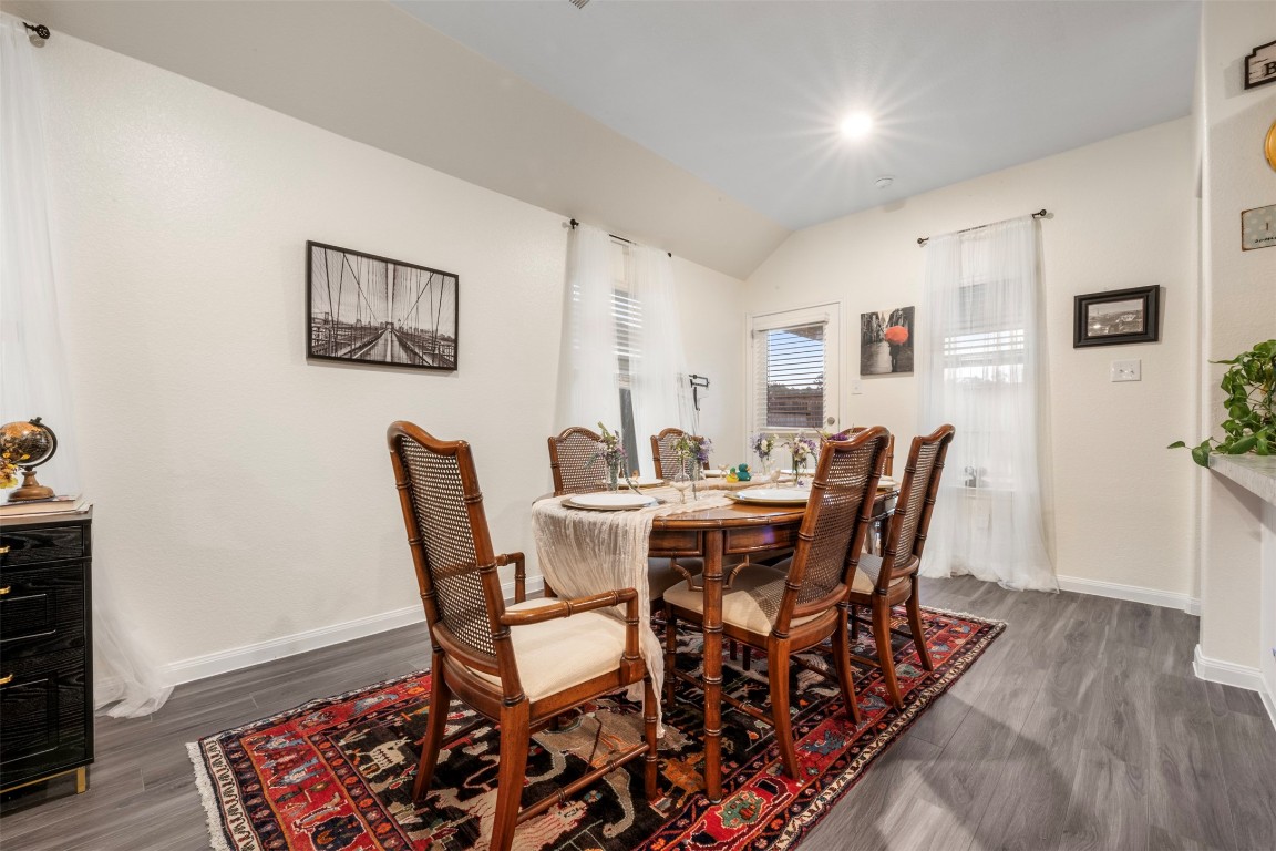 22565 Cormorant Court Splendora, TX 77372 - Photo 14 of 31 a view of a dining room with furniture and wooden floor