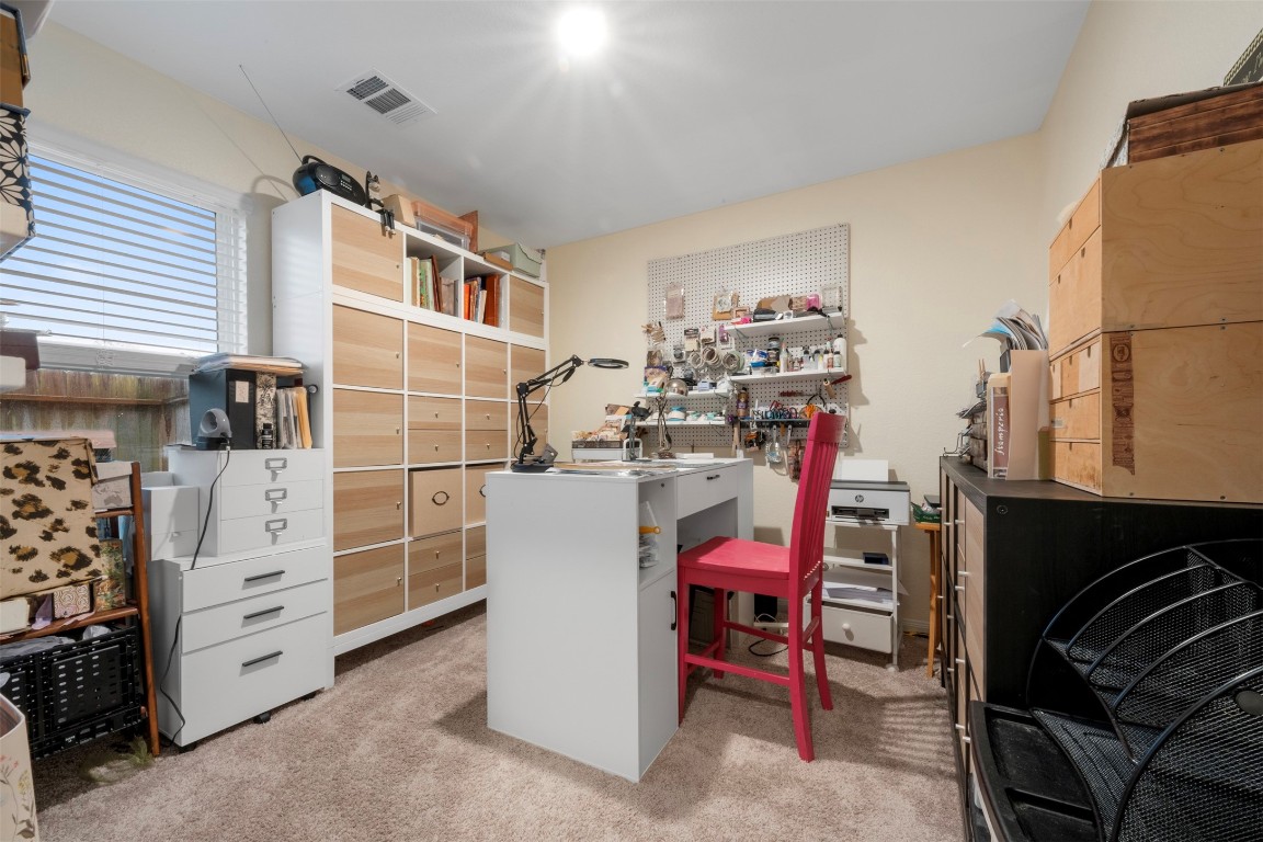 22565 Cormorant Court Splendora, TX 77372 - Photo 24 of 31 a view of dinning room with furniture and a kitchen