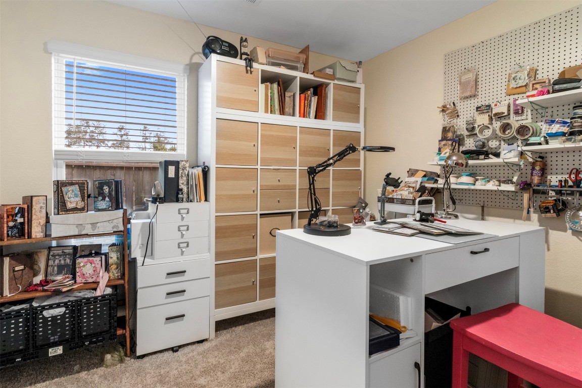 22565 Cormorant Court Splendora, TX 77372 - Photo 25 of 31 a utility room with cabinets and furniture