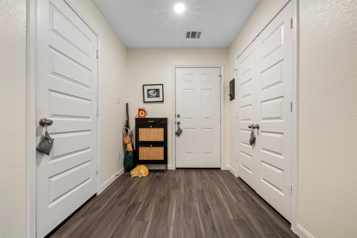 22565 Cormorant Court Splendora, TX 77372 - Photo 7 of 31 a view of walk in closet with empty racks