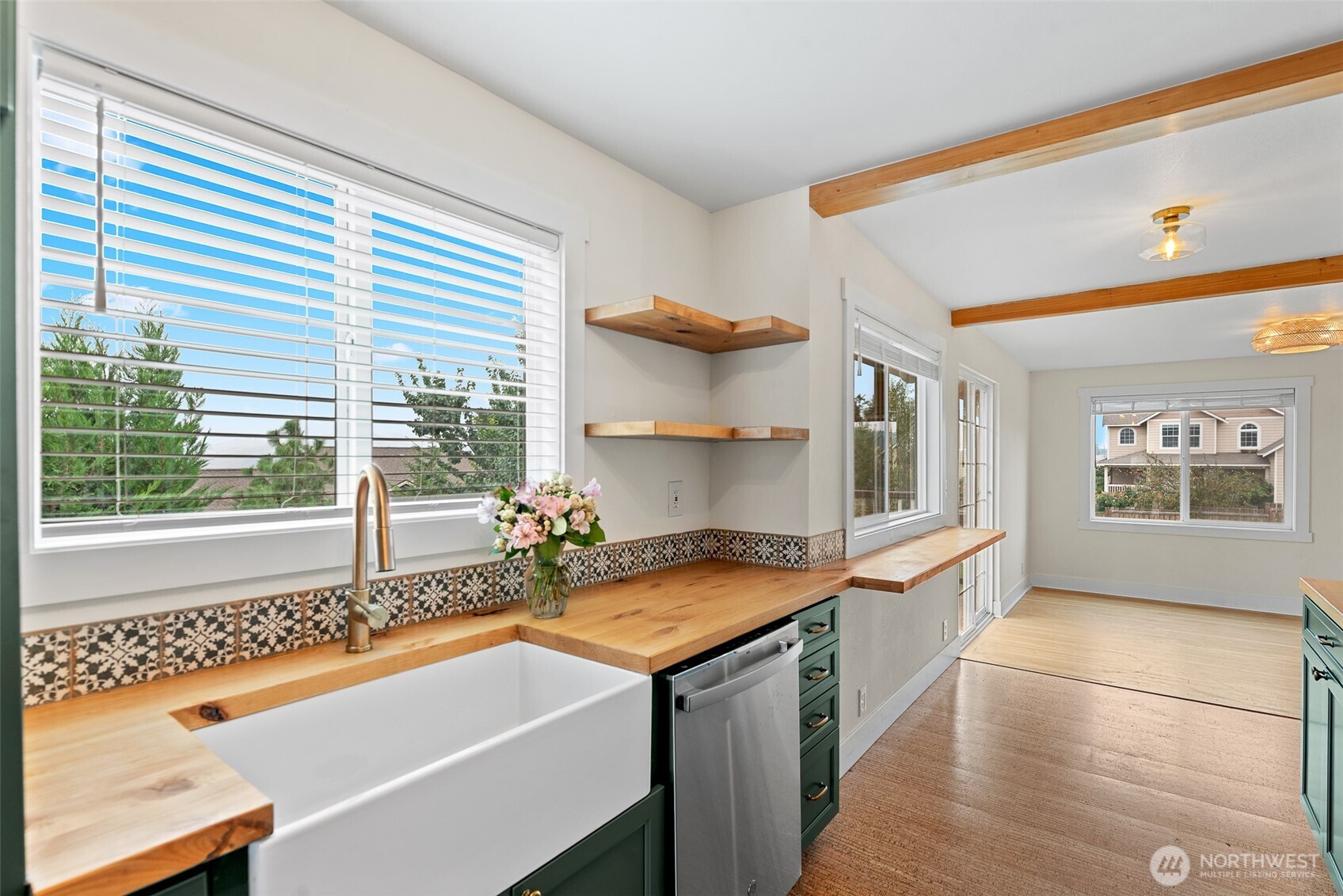 3724 School Street Wenatchee, WA 98801 - Photo 12 of 40 a kitchen with a sink and a refrigerator