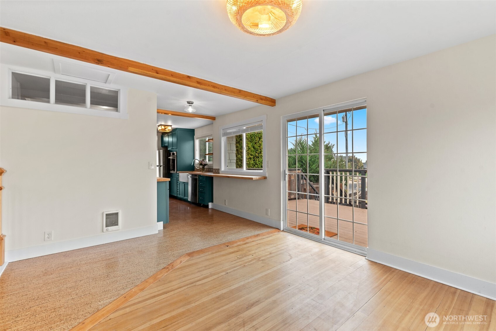 3724 School Street Wenatchee, WA 98801 - Photo 15 of 40 an empty room with wooden floor and windows
