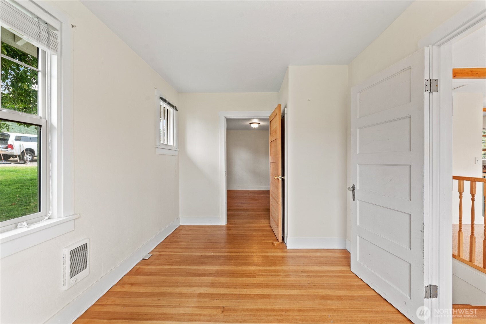 3724 School Street Wenatchee, WA 98801 - Photo 18 of 40 a view of a hallway with wooden floor and staircase