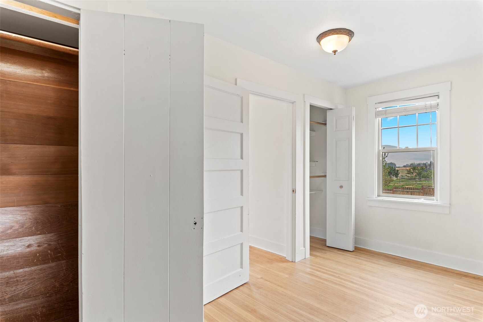 3724 School Street Wenatchee, WA 98801 - Photo 20 of 40 a view of an empty room with wooden floor and a window