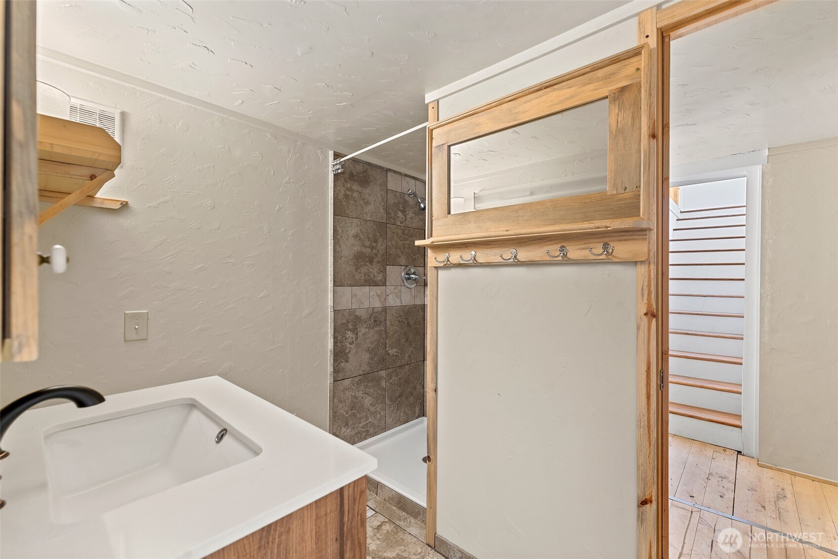 3724 School Street Wenatchee, WA 98801 - Photo 30 of 40 a bathroom with a bathtub and a shower