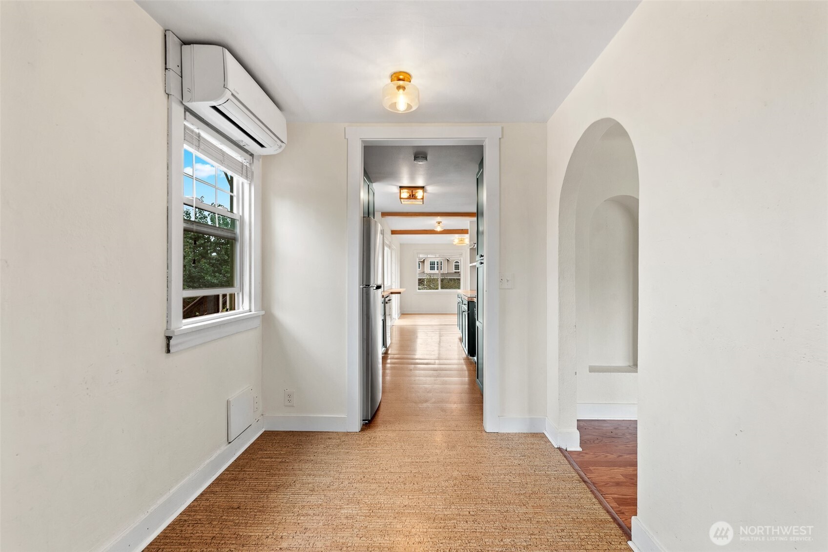 3724 School Street Wenatchee, WA 98801 - Photo 4 of 40 a view of a hallway with wooden cabinet and a living room