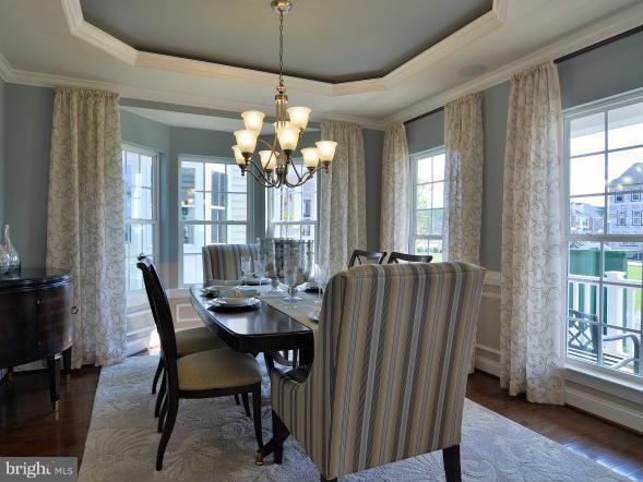 2505 Baileys Pond Road Accokeek, MD 20607 - Photo 3 of 16 a view of a dining room with furniture window and wooden floor