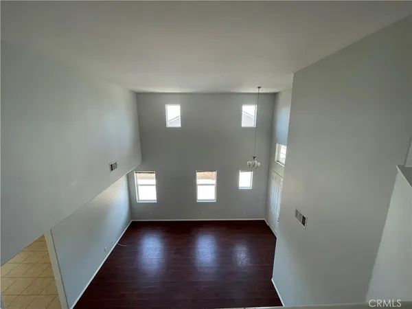 a spacious bathroom with a sink a mirror and a shower