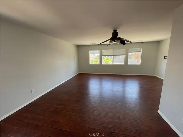 a spacious bathroom with a double vanity sink mirror and shower