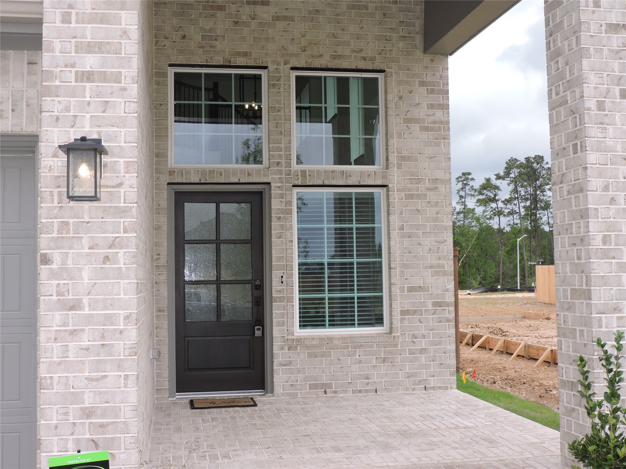 12853 Meadow Wind Way Conroe, TX 77302 - Photo 4 of 47 Double Car Garage, Insulated Low E Energy Efficient windows, Energy Efficient HVAC, Tankless Hot Water Heater Sprinklers front and back and So Much More.