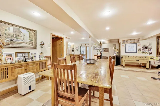 a living room with furniture and a table