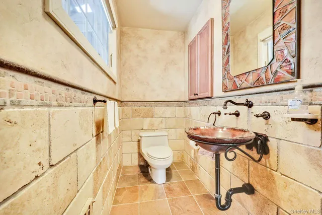 a bathroom with a sink and a toilet