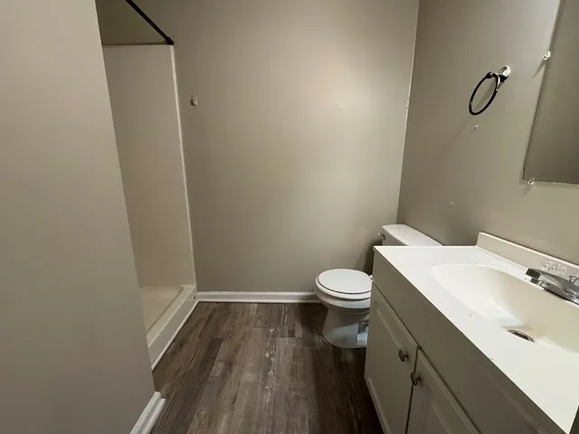 a bathroom with a sink and toilet