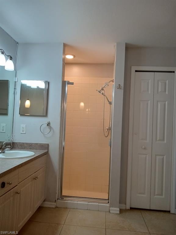 9148 Henry Road Fort Myers, FL 33967 - Photo 13 of 34 a bathroom with a sink and a mirror