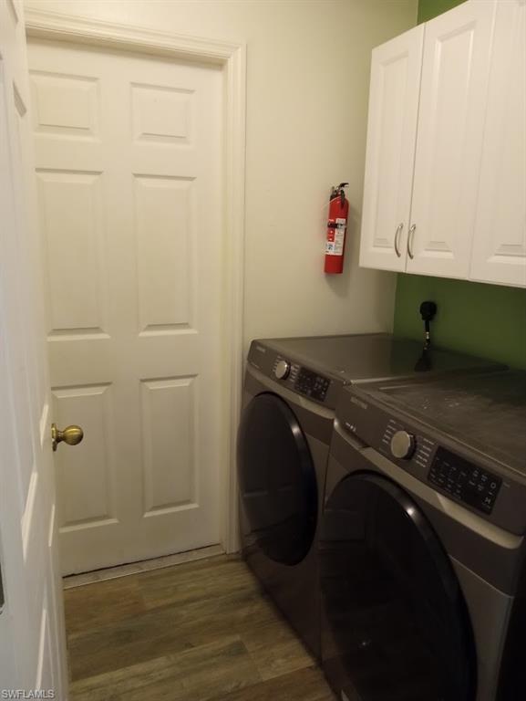 9148 Henry Road Fort Myers, FL 33967 - Photo 14 of 34 a utility room with closet and dryer