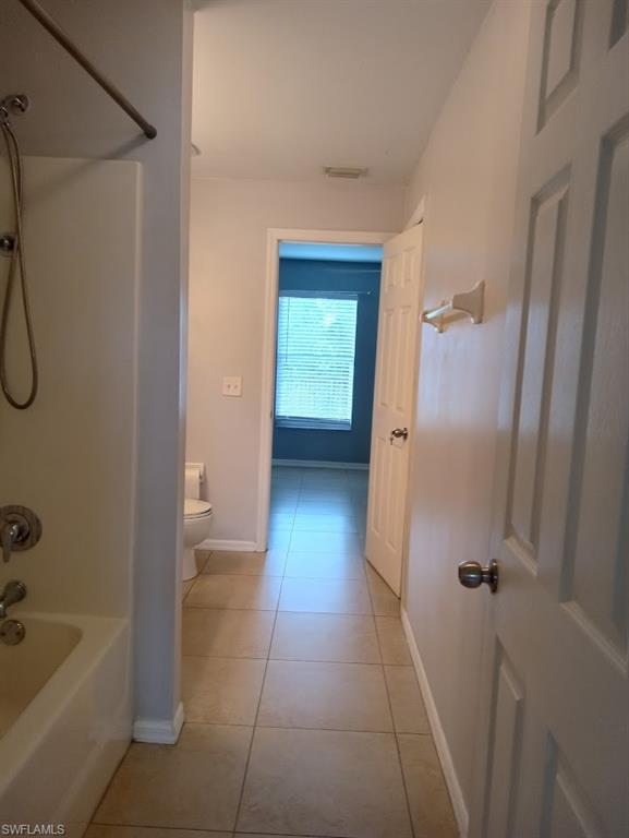 9148 Henry Road Fort Myers, FL 33967 - Photo 19 of 34 a bathroom with a shower and a tub