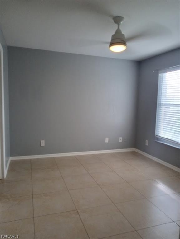 9148 Henry Road Fort Myers, FL 33967 - Photo 22 of 34 a view of an empty room and window