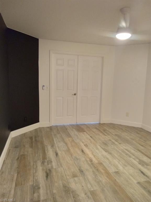9148 Henry Road Fort Myers, FL 33967 - Photo 23 of 34 a view of an empty room and chandelier fan