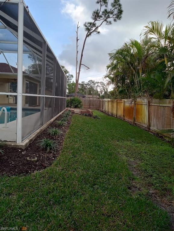 9148 Henry Road Fort Myers, FL 33967 - Photo 30 of 34 a view of a backyard