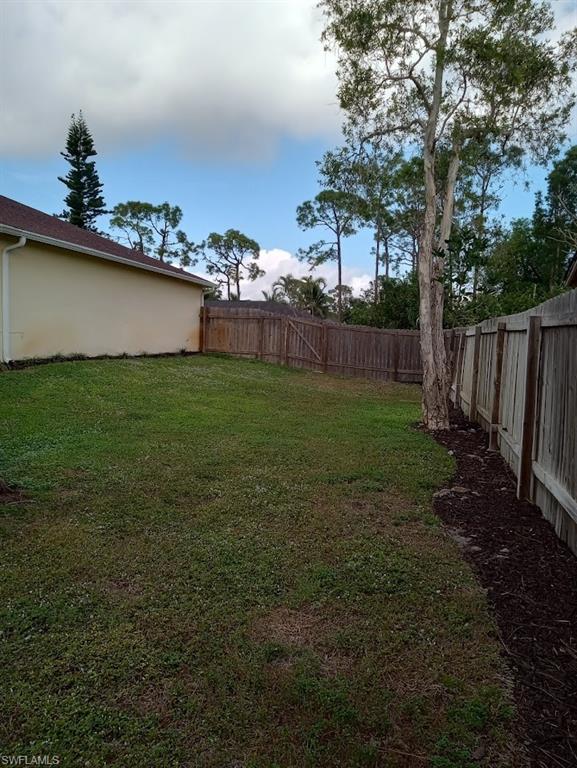 9148 Henry Road Fort Myers, FL 33967 - Photo 32 of 34 a view of a backyard