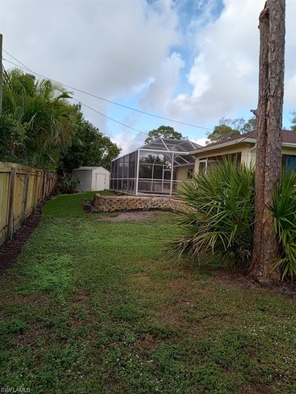 9148 Henry Road Fort Myers, FL 33967 - Photo 34 of 34 a view of a house with backyard and sitting area