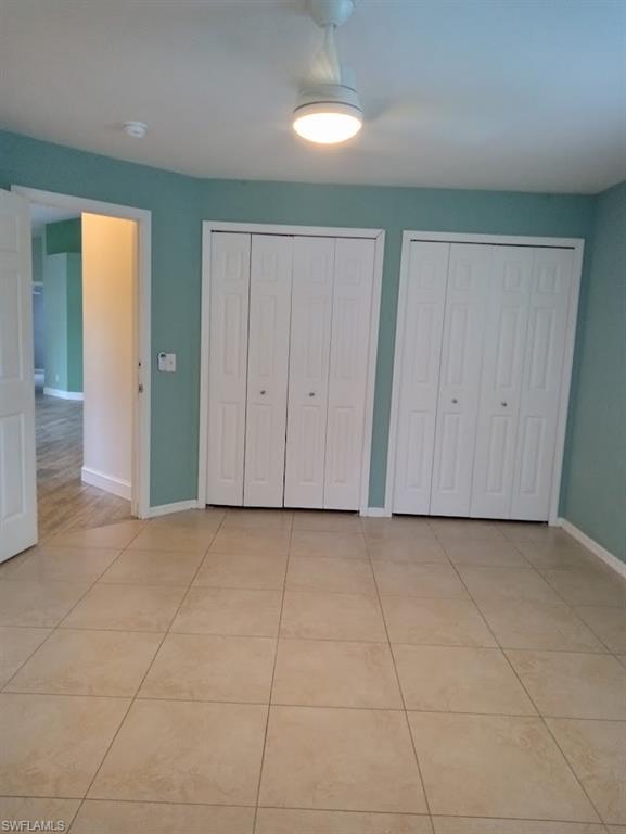 9148 Henry Road Fort Myers, FL 33967 - Photo 6 of 34 an empty room with a bathroom