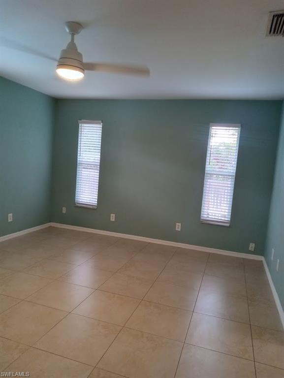 9148 Henry Road Fort Myers, FL 33967 - Photo 7 of 34 a view of an empty room and window