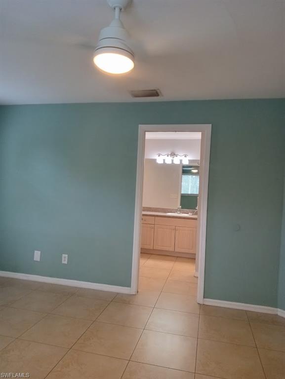 9148 Henry Road Fort Myers, FL 33967 - Photo 10 of 34 a view of an empty room with a window