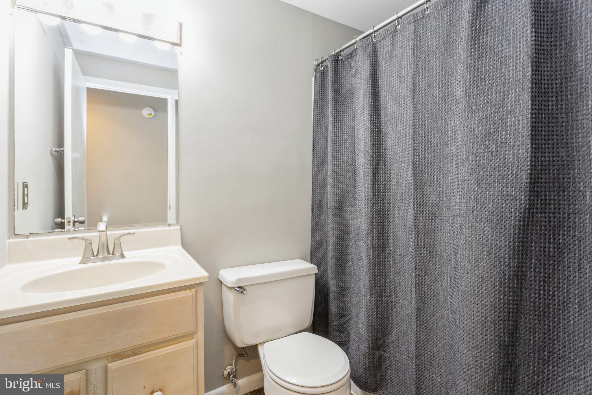 9318 Tulsemere Road Randallstown, MD 21133 - Photo 17 of 29 Hall Bathroom