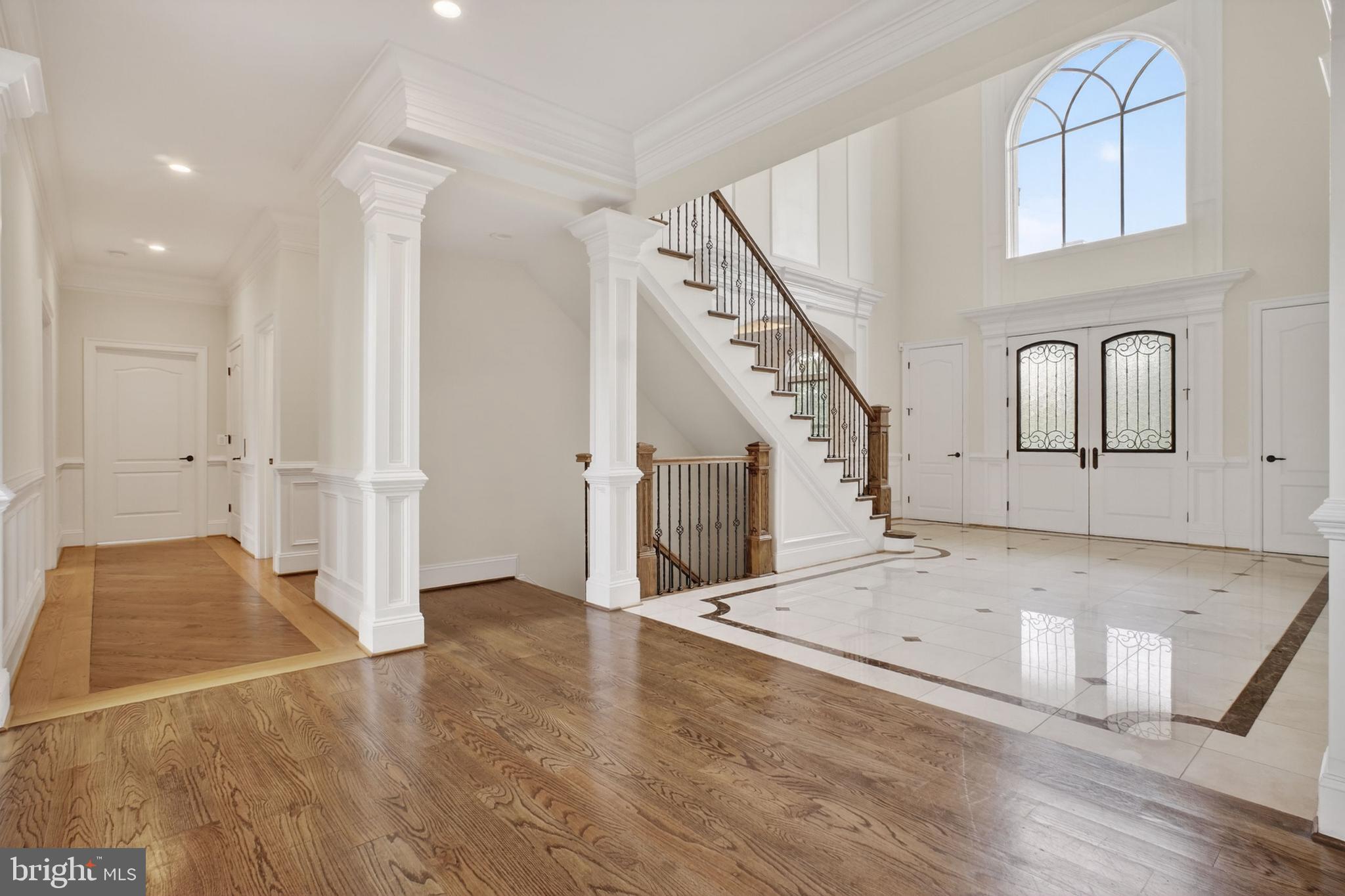 7112 Georgetown Pike McLean, VA 22101 - Photo 15 of 59 Elegant foyer with rich hardwood
floors.