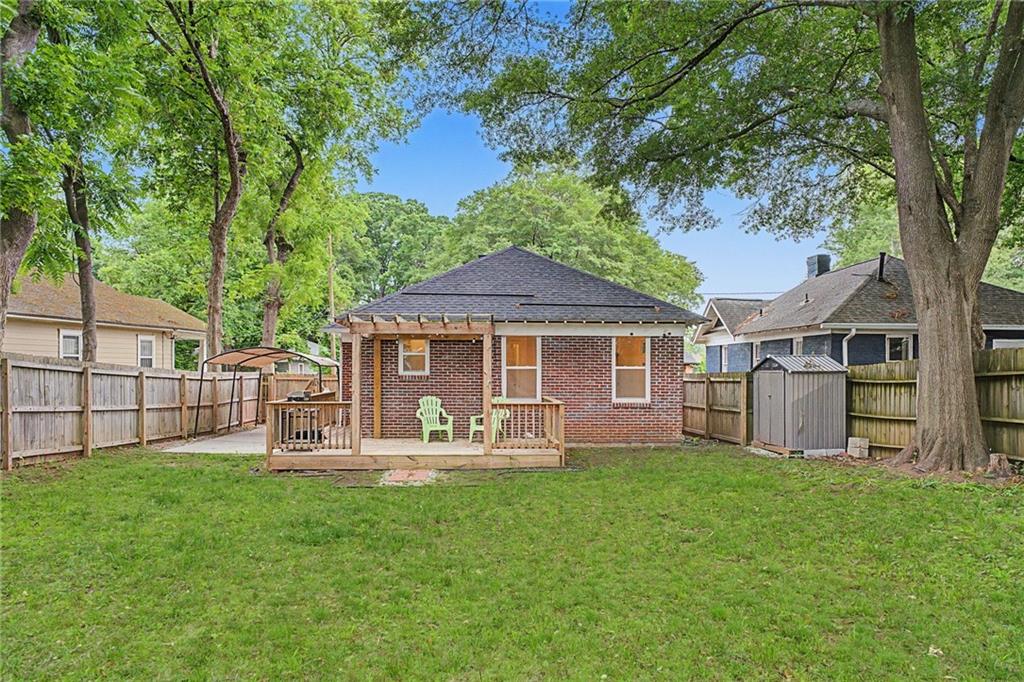 827 Elbert Street Southwest Atlanta, GA 30310 - Photo 26 of 33 a front view of a house with garden