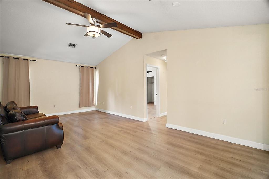 2309 Fairview Eustis, FL 32726 - Photo 20 of 27 a view of an empty room with wooden floor