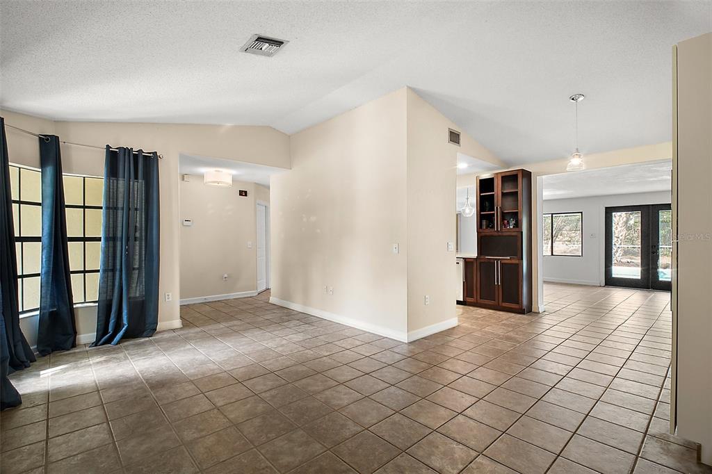 2309 Fairview Eustis, FL 32726 - Photo 25 of 27 a view of empty room with a fireplace and cabinet