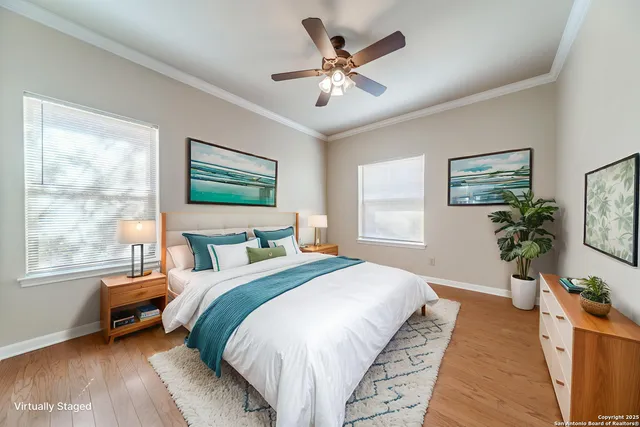 a spacious bedroom with a large bed and a window