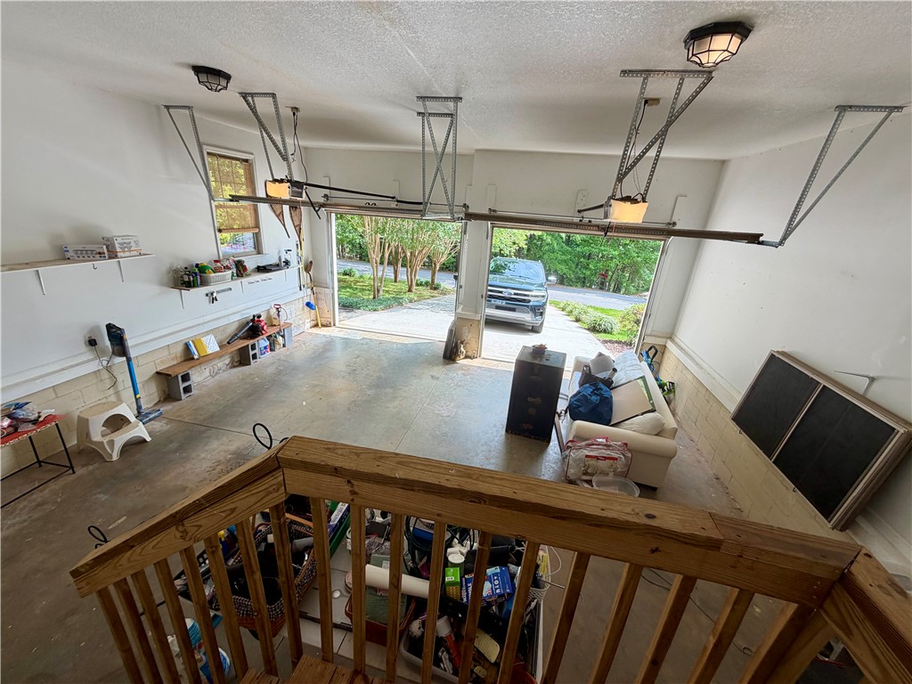 232 Hunters Trail Walhalla, SC 29691 - Photo 29 of 38 This spacious garage offers ample room for vehicles and additional storage.