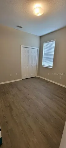 a house with garden in front of it