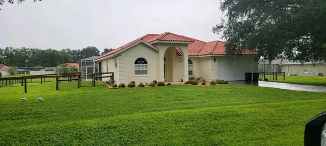 a house view with a garden space