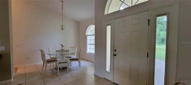a view of a livingroom with furniture and window