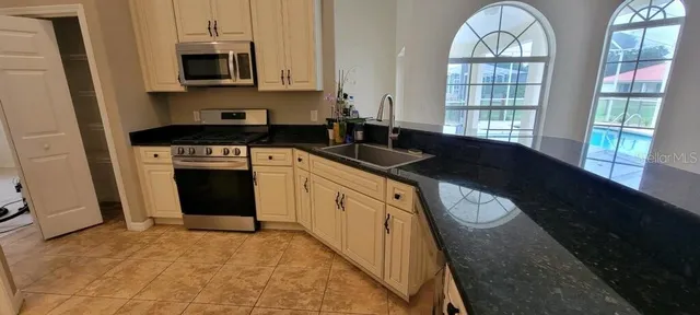 a view of entryway with furniture and a window