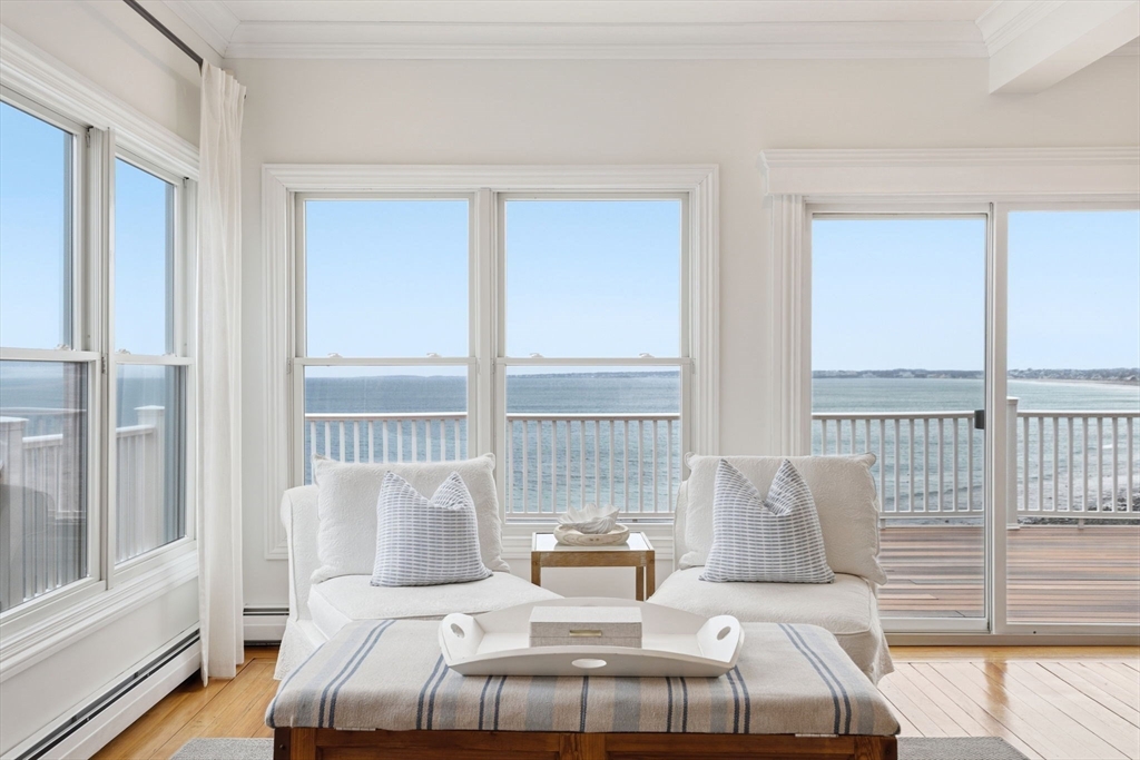 60 Holbrook Avenue Hull, MA 02045 - Photo 1 of 37 a bed room with a bed and a large window