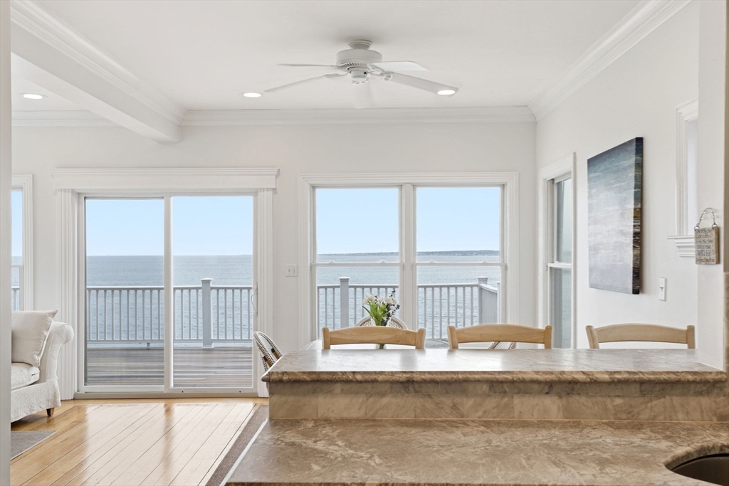 60 Holbrook Avenue Hull, MA 02045 - Photo 15 of 37 a living room with a large window and ceiling fan
