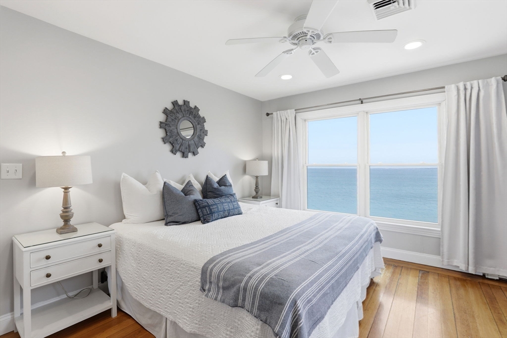 60 Holbrook Avenue Hull, MA 02045 - Photo 17 of 37 a bedroom with a large bed and a window