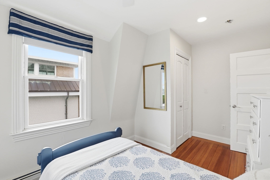 60 Holbrook Avenue Hull, MA 02045 - Photo 21 of 37 a bedroom with a bed and a window